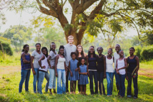 A group of people posing for a family photo