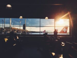 perspective of looking outside through the windows of an airport